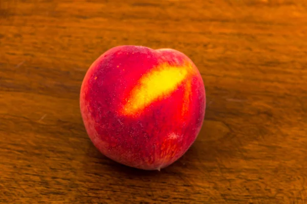 Peach on a Table — Stock Photo, Image