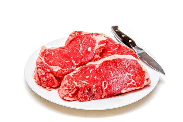 Plate of Steaks and Knife — Stock Photo, Image