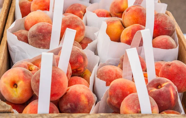 Peaches in Bags and Crates for Sale — Stock Photo, Image