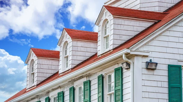 Dormers on Red Roof with Green Shutters — Stock Photo, Image