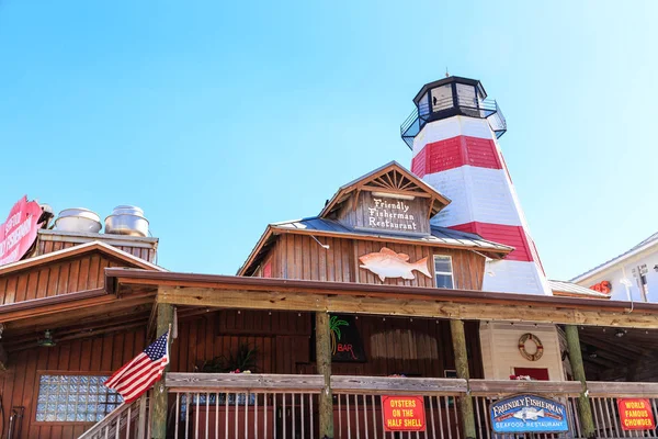 Farol em amigável pescador — Fotografia de Stock