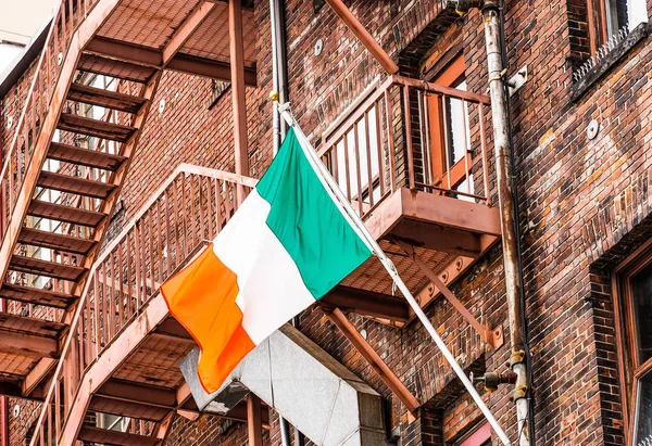 Irish Flag on Old Red Brick Buildings — Stock Photo, Image