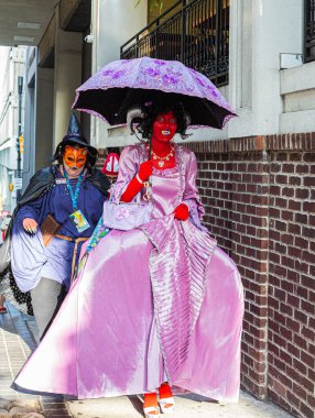 Red Vampire Walking to Parade