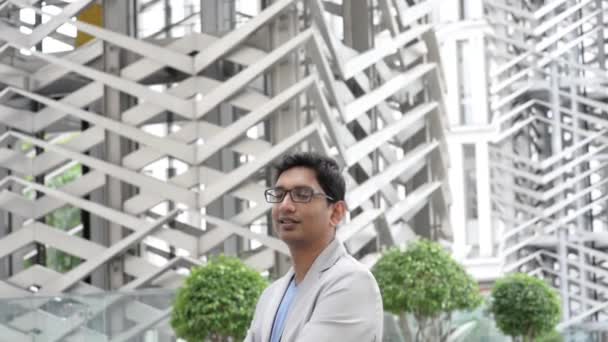 Portrait Good Looking Smiling Indian Businessman Standing Modern Building Natural — Stock Video