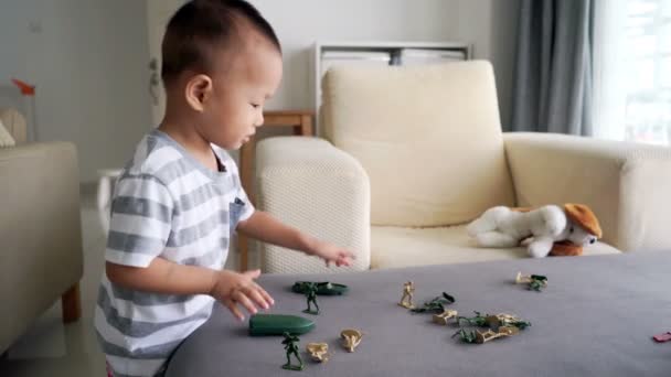 Two Three Years Old Child Playing Soldiers Figurine Toys Wars — Stock Video