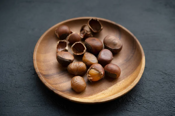 Chestnuts Wooden Plate Dark Background — Stock Photo, Image