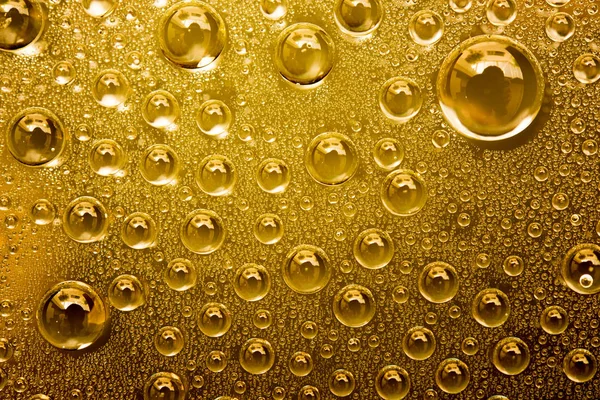 Water Drops Gouden Achtergrond Close — Stockfoto