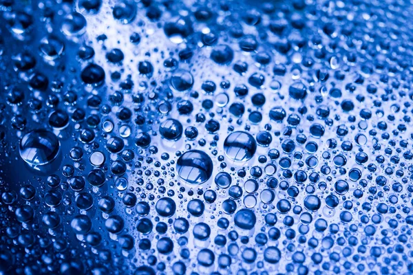 Water Druppels Blauwe Achtergrond Close — Stockfoto