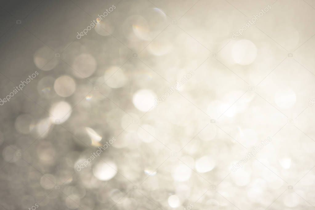 Abstract bokeh lights with soft light background.
