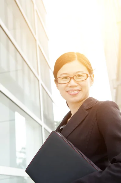 Asian Executive Smiles Standing Outdoors — Stock Photo, Image