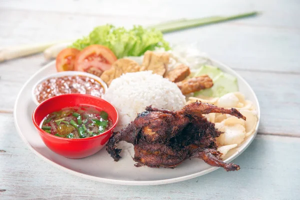 Nasi lemak kukus with quail meat — Stock Photo, Image