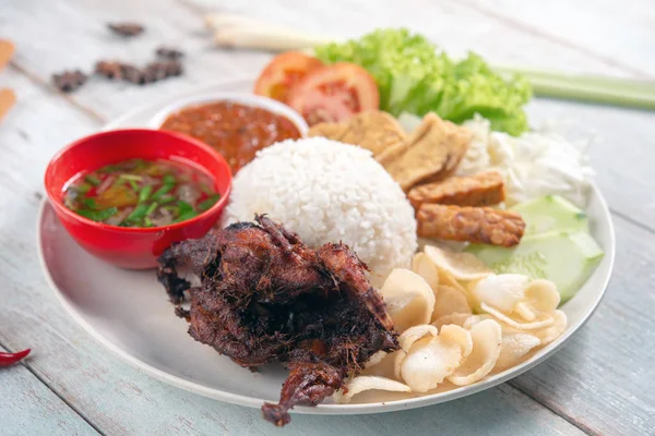 Nasi lemak kukus with quail meat — Stock Photo, Image