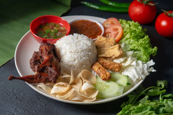 Nasi lemak kukus with quail meat — Stock Photo, Image