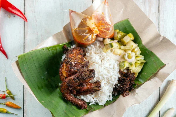 Nasi lemak kukus with quail — Zdjęcie stockowe