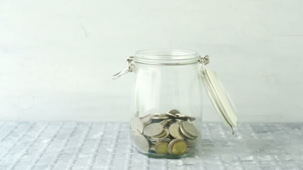 Coins Falling Money Jar Decrease Till Empty — Stock Video