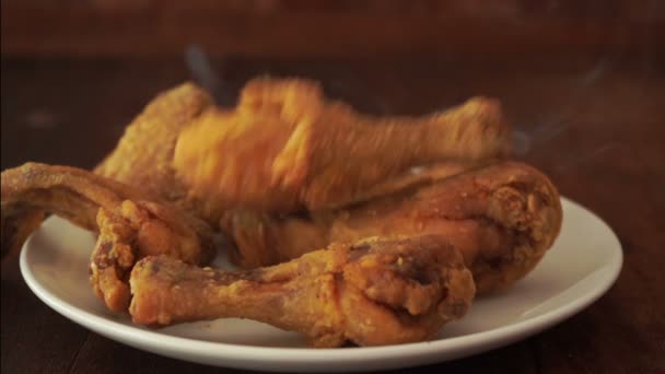 Original Recipe Fried Chicken Dropped Plate Brown Background — Stock Video