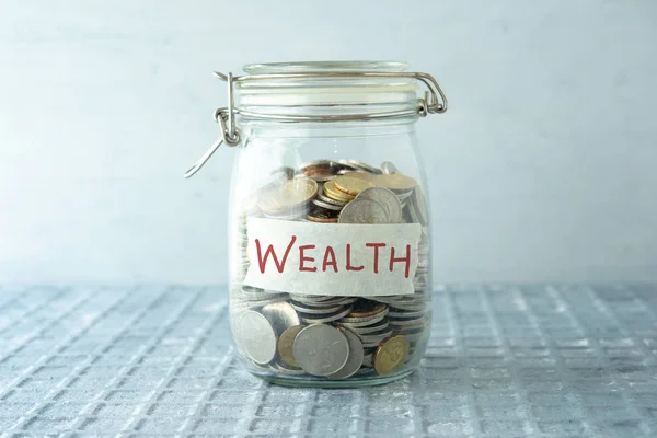 Saving jar with coins — Stock Photo, Image