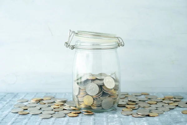 Saving jar with coins — Stock Photo, Image