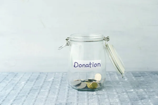 Saving jar with coins — Stock Photo, Image