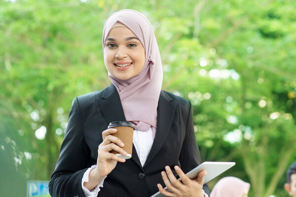 Muslim business woman going to work