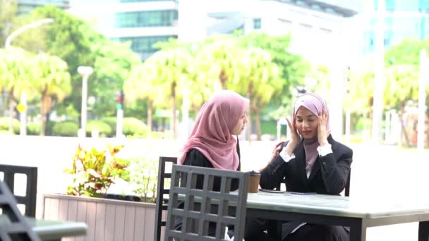 Muslim Office Woman Having Headache Sitting Outdoor — Stock Video