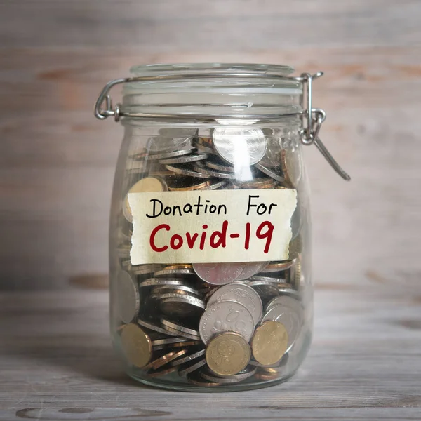 Coins Glass Money Jar Donation Covid19 Label Financial Concept Vintage Royalty Free Stock Photos