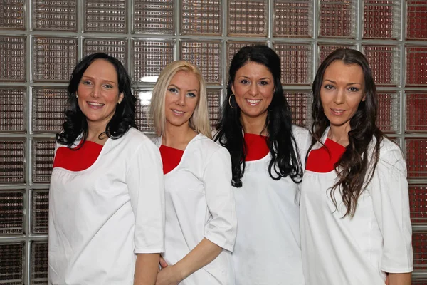 Quatro Médicas Dentistas Com Uniformes Brancos — Fotografia de Stock