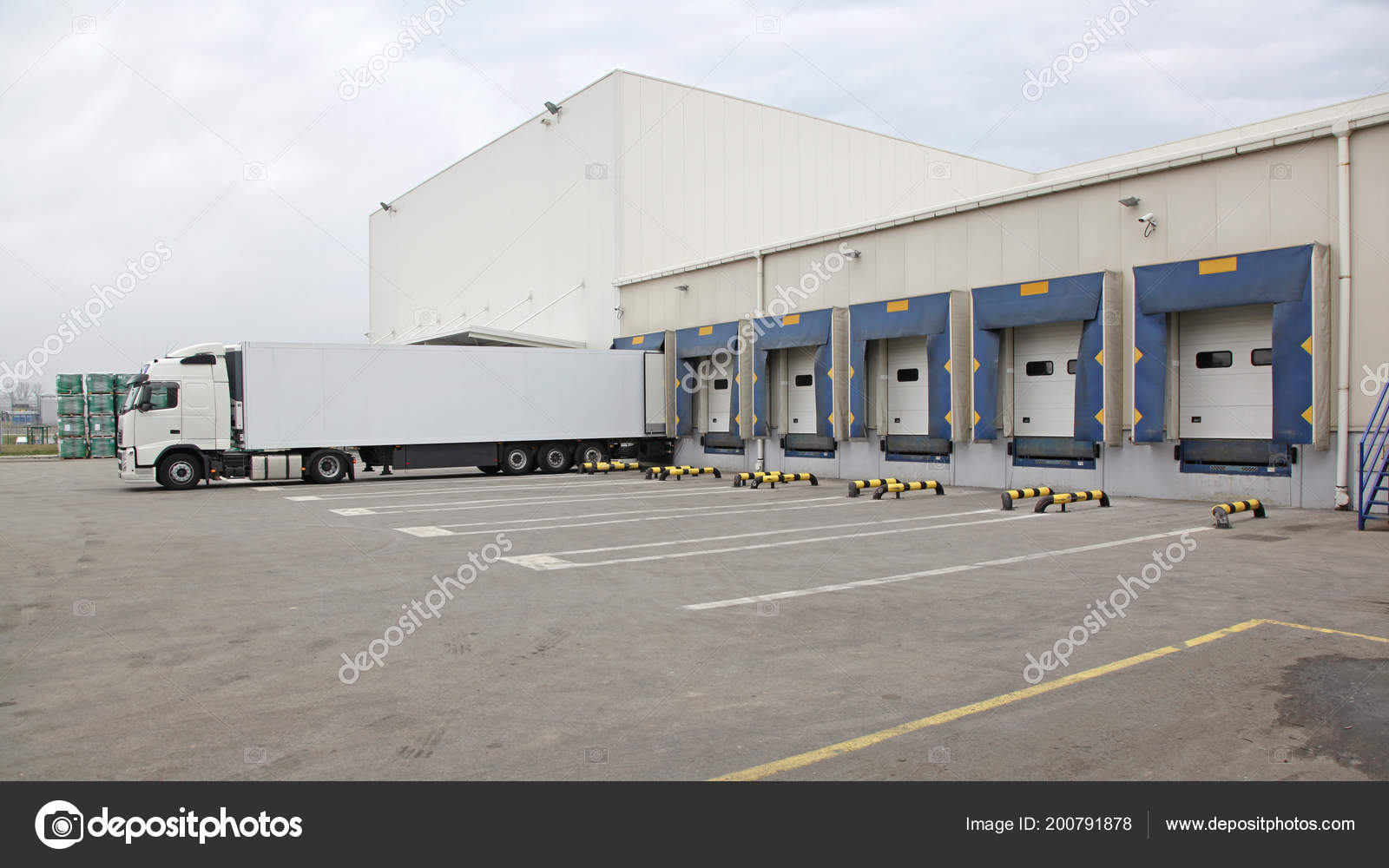 White Semi Truck Trailer Warehouse Loading Ramp Stock Photo by