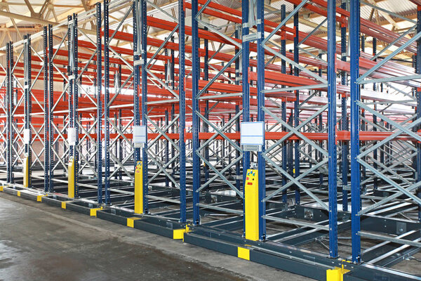 Powered Mobile Aisle Shelves in Distribution Warehouse