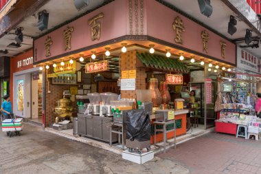 KOWLOON, HONG KONG - APRIL 21, 2017: Traditional Chinese Tea Shop at Bute Street in Kowloon, Hong Kong. clipart