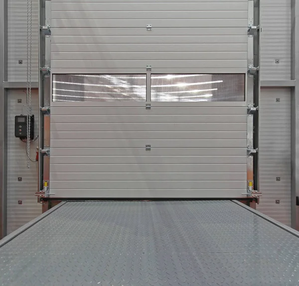 Industrial Roll Loading Cargo Door in Warehouse