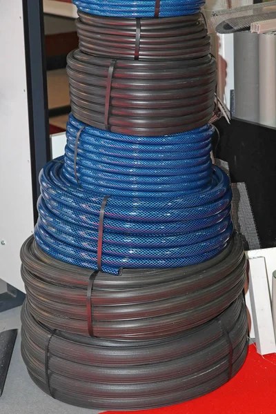 New Rubber Garden Hoses Coils Stack — Stock Photo, Image