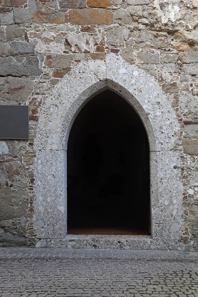 Small Gothic Stone Arch Chapel Door Exterior