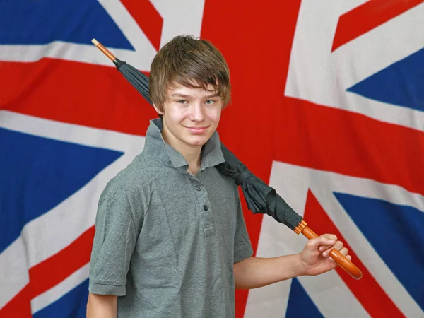 Молодий Британський Хлопчик Парасолькою Перед Прапором Союзу Джека — стокове фото