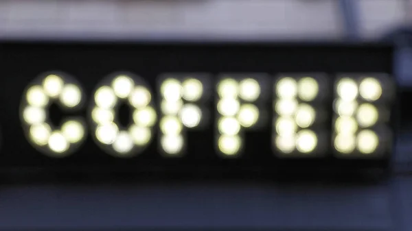 抽象咖啡标志与白色灯泡布鲁以 — 图库照片