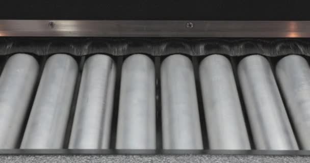 Close Moving Metal Conveyor Rollers Transport — Stock Video
