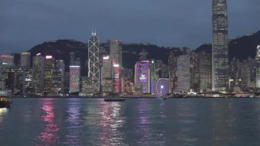 Hong Kong, China - April 24, 2017: Skyscrapers Buildings Illumination Light at Dusk in Hong Kong, China.
