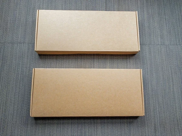 Deux Longs Paquets Boîtes Carton Fermés — Photo