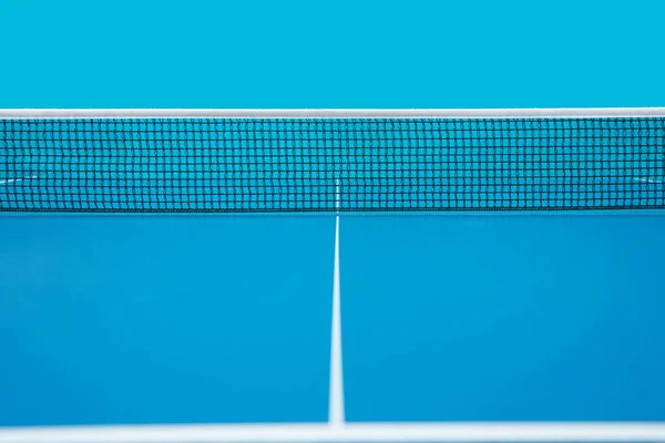 Tennis table of blue color, close-up