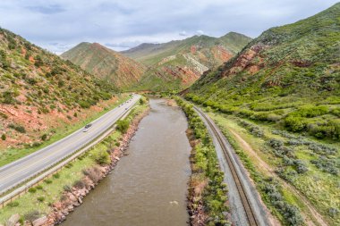 Aerial view of Colorado River and I-70 highway at South Canyon below Glenwood Springs, Colorado clipart
