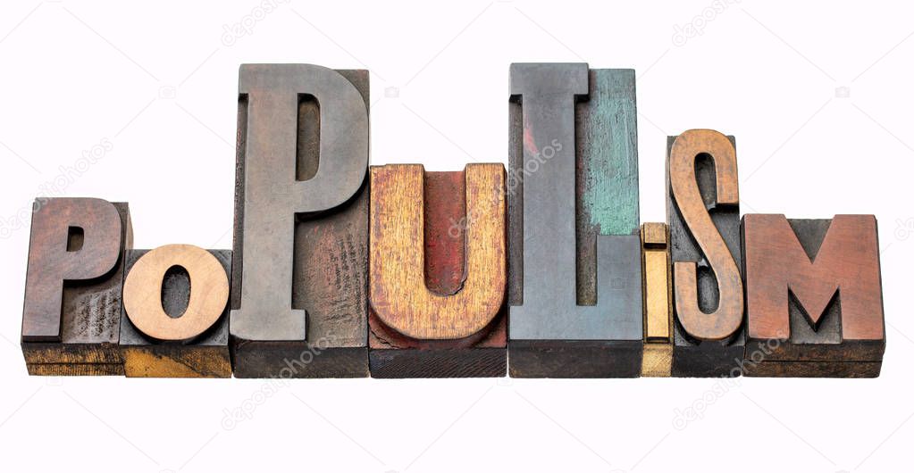populism - isolated word abstract in vintage letterpress wood type blocks, mixed fonts