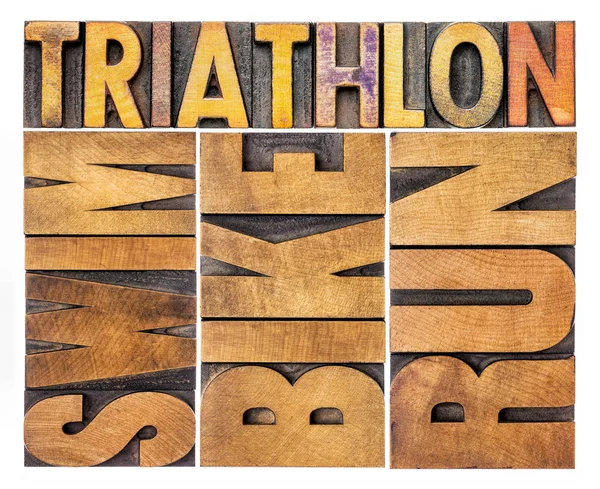 Trathlon Schwimmen Radfahren Laufen Isolierte Wortabstraktion Vintage Buchdruck Holzart Mit — Stockfoto