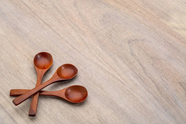 Three Hardwood Teasppons Grained Wooden Background Copy Space — Stock Photo, Image