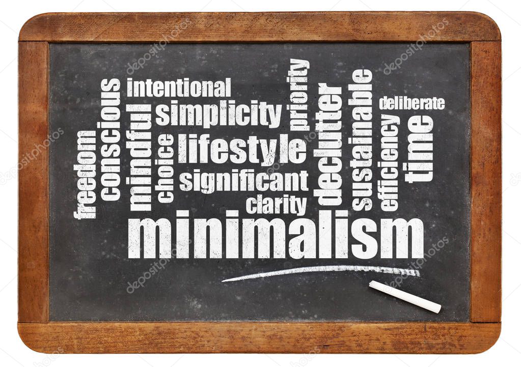 cloud of words associated to minimalism as a lifestyle - white chalk text on a slate blackboard