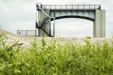 A viewing platform on the remains of Lock and Dam No. 26 near Alton, Illinois on the Upper Mississippi River -m Lincoln Shields Recreation Area clipart