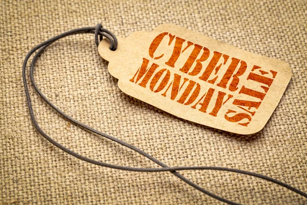 Cyber Monday Sale sign - a paper price tag with a twine iagainst burlap canvas