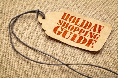 Tatil alışveriş rehberi oturum - bir kağıt fiyat etiketi ile bir sicim iagainst çuval bezi tuval