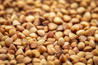 arka plan ve Kavrulmuş buğday kaşa - gluten free hububat, seçici odak dokusuna