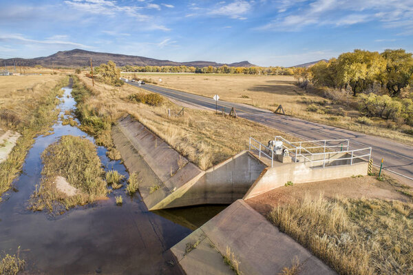 water diversion ditch at foothills of Rocky Mountains in northern Colorado - aerial view