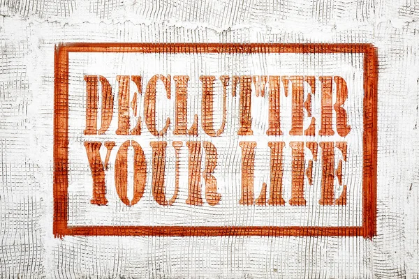 Declutter Your Life Graffiti Style Sign Stucco Wall — Stock Photo, Image